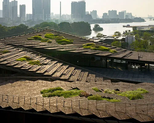 Kengo Kuma's Masterpiece: Guangzhou's Historic Shipyard Reborn as Riverfront Arts Hub with Volcanic Stone Landscape