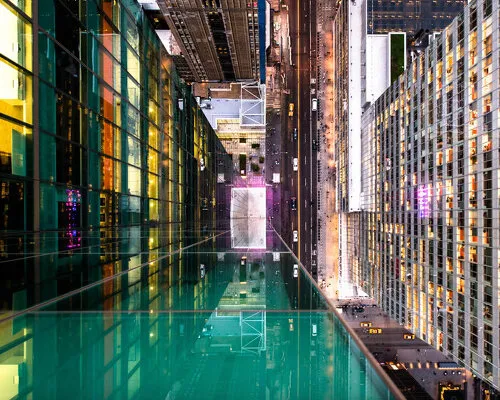 New York's Glass Canvas: The Interplay of Reflection, Geometry, and Urban Illusion