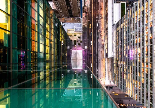 New York's Glass Canvas: The Interplay of Reflection, Geometry, and Urban Illusion