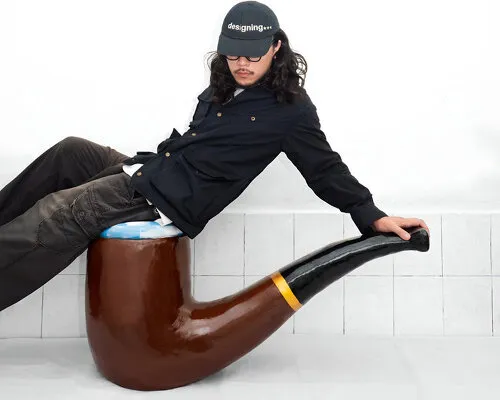 Redefining Reality: Magritte's Pipe Transforms into a Meditative Seating Object