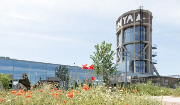 The NYMA Water Tower: A Beacon of Industrial Reimagination and Urban Revitalization